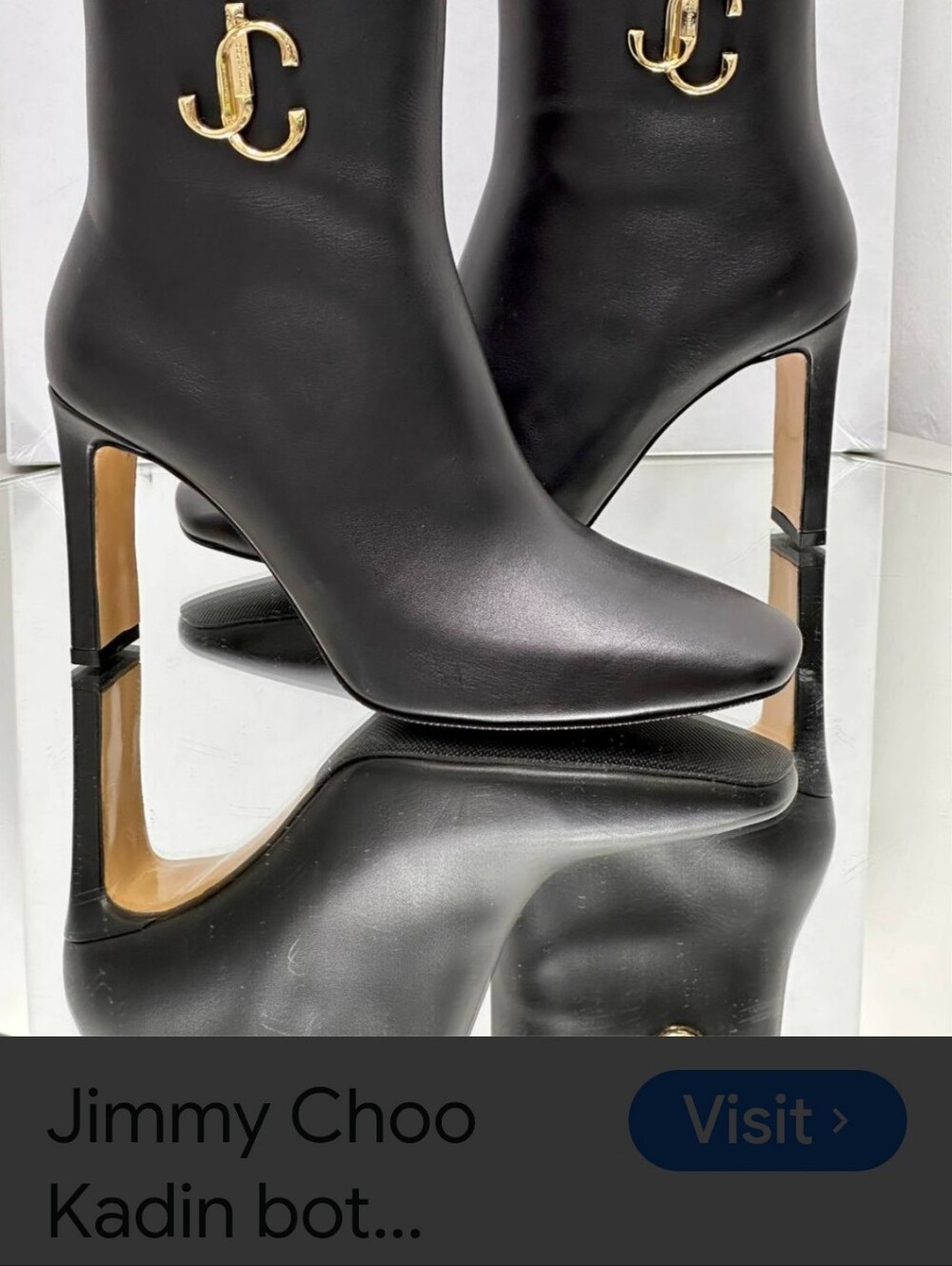 Jimmy Choo Black Leather Stiletto Ankle Boots with Gold Logo